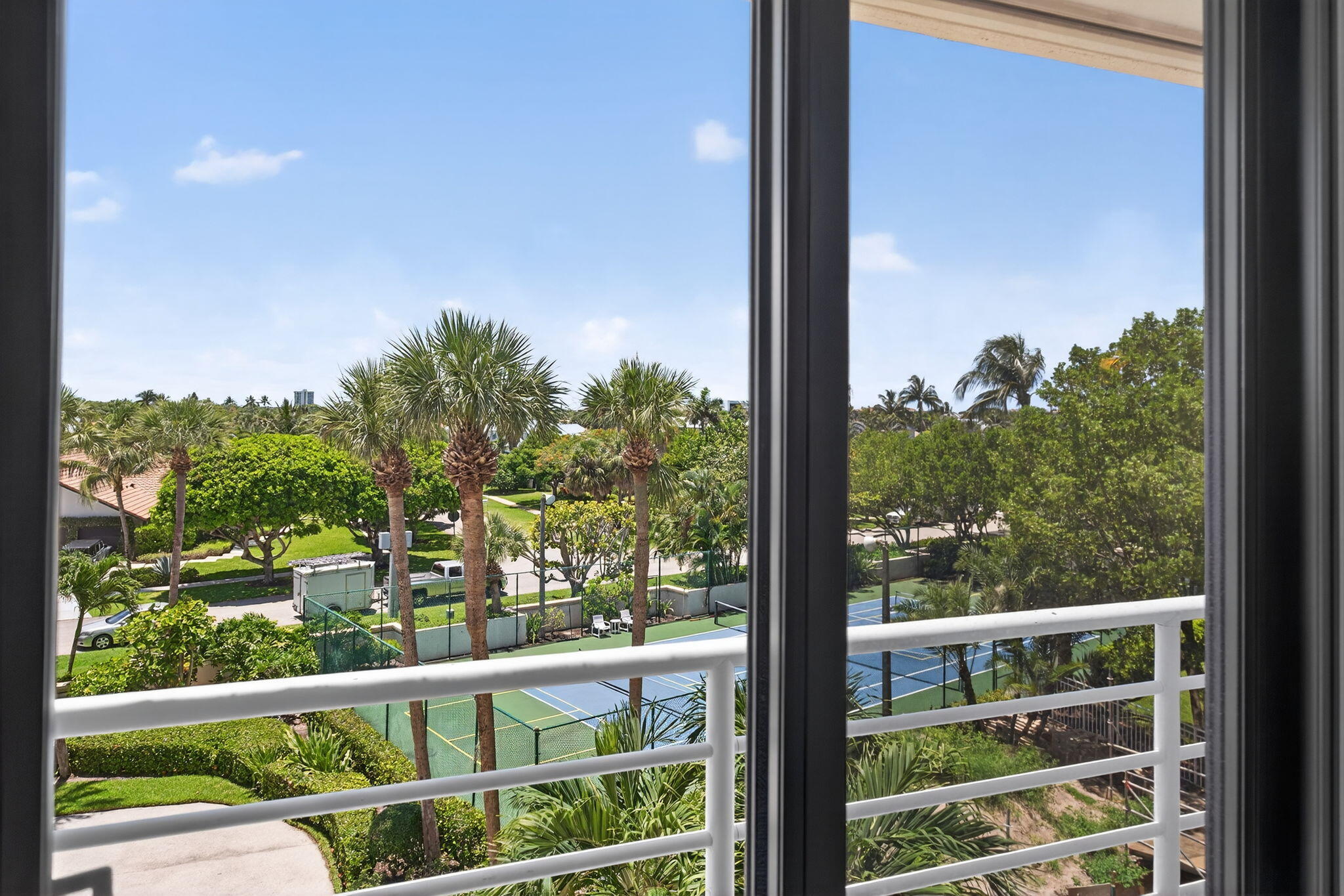 176 Helios Drive, Unit 210 Jupiter, FL 33477 - Photo 29 of 47 Balcony with Sunset Views