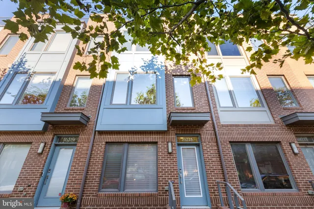 a view of a building with a tree
