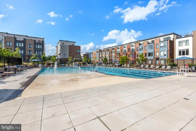 a view of a building with a yard