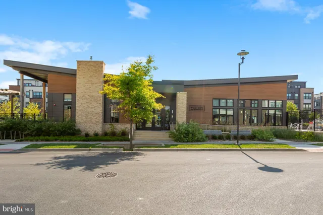 a picture of a bathroom with a shower and a mirror