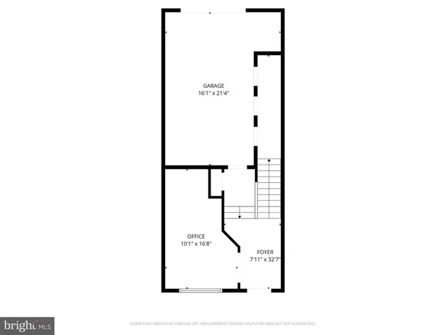 a picture of a bench in front of a wall