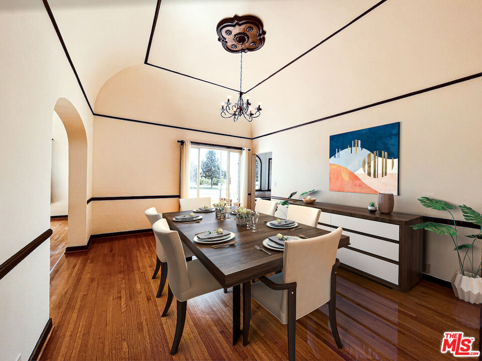 6187 Barrows Drive Los Angeles, CA 90048 - Photo 6 of 35 a dining room with furniture and wooden floor