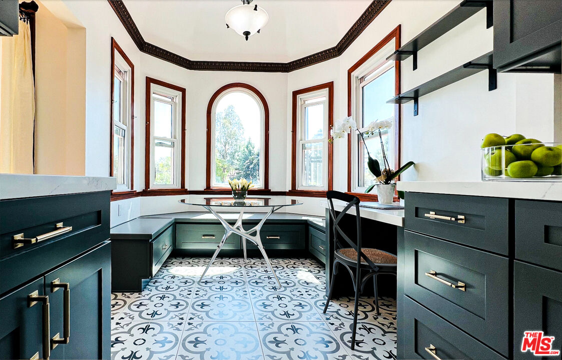 6187 Barrows Drive Los Angeles, CA 90048 - Photo 10 of 35 a view of a workspace with furniture and window