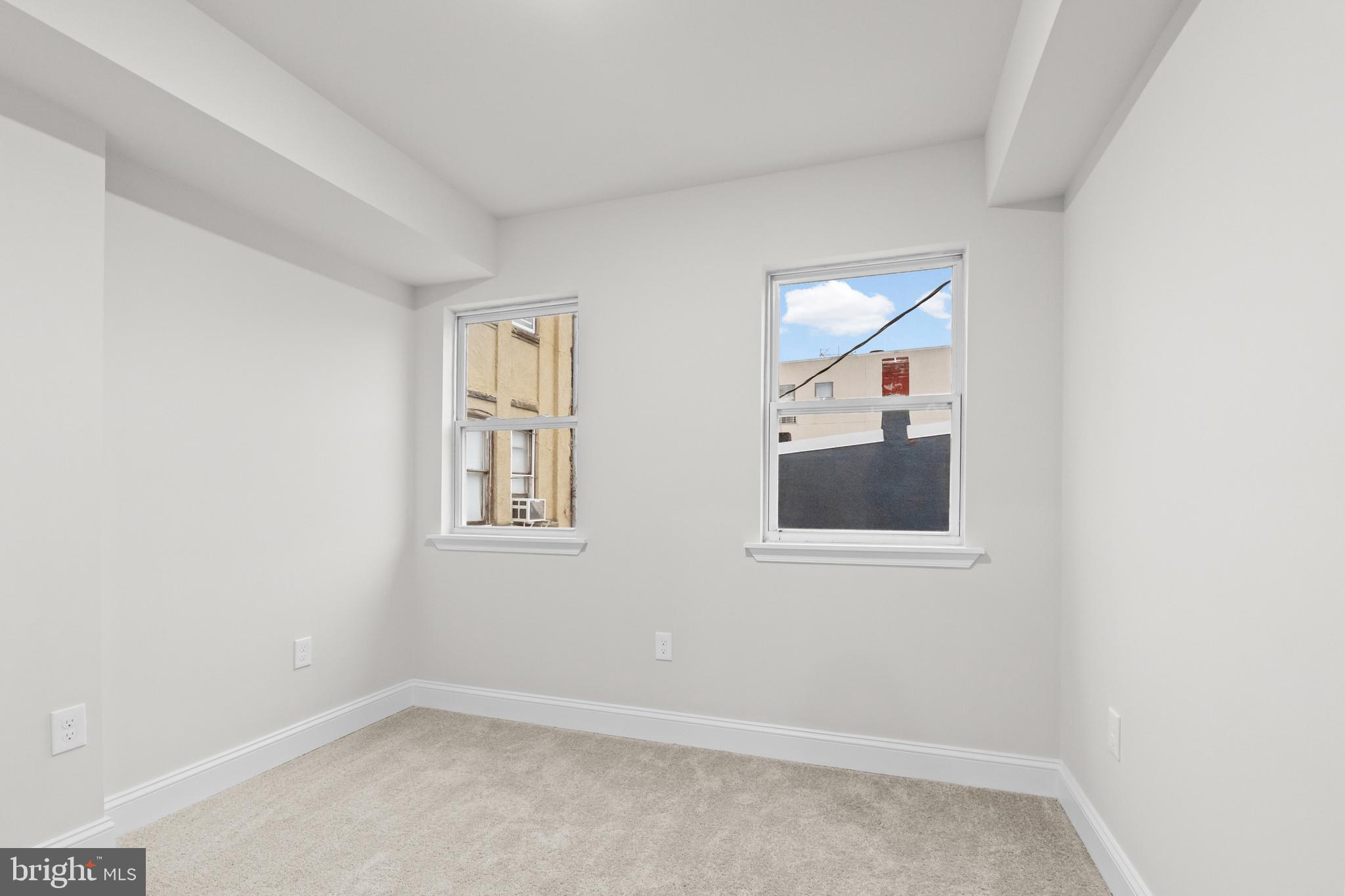 2103 McCulloh Street Baltimore, MD 21217 - Photo 25 of 56 an empty room with a window