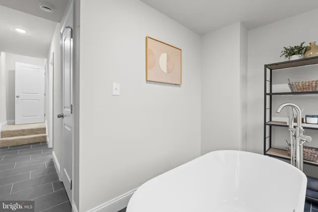 a bathroom with a shower and bathtub