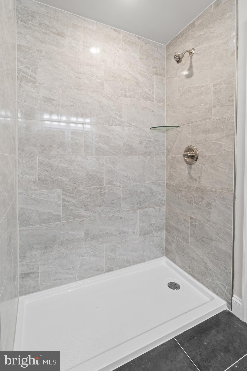 2103 McCulloh Street Baltimore, MD 21217 - Photo 34 of 56 a bathroom with a shower and bathtub