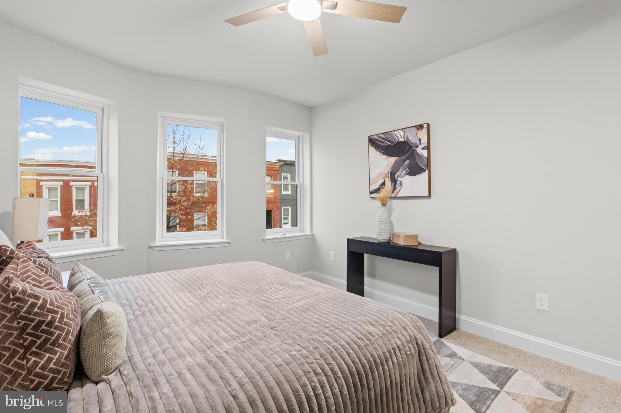 2103 McCulloh Street Baltimore, MD 21217 - Photo 37 of 56 a bedroom with a bed and a window
