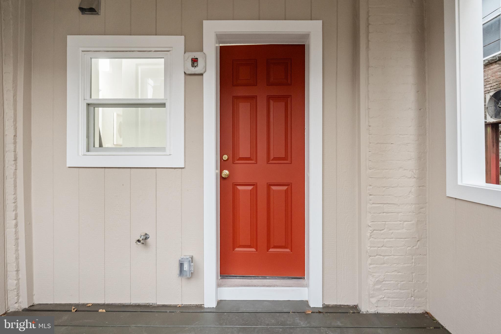 2103 McCulloh Street Baltimore, MD 21217 - Photo 49 of 56 an entrance door with a window