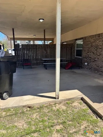 a view of a room with an empty space