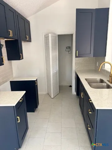 a view of empty room with windows