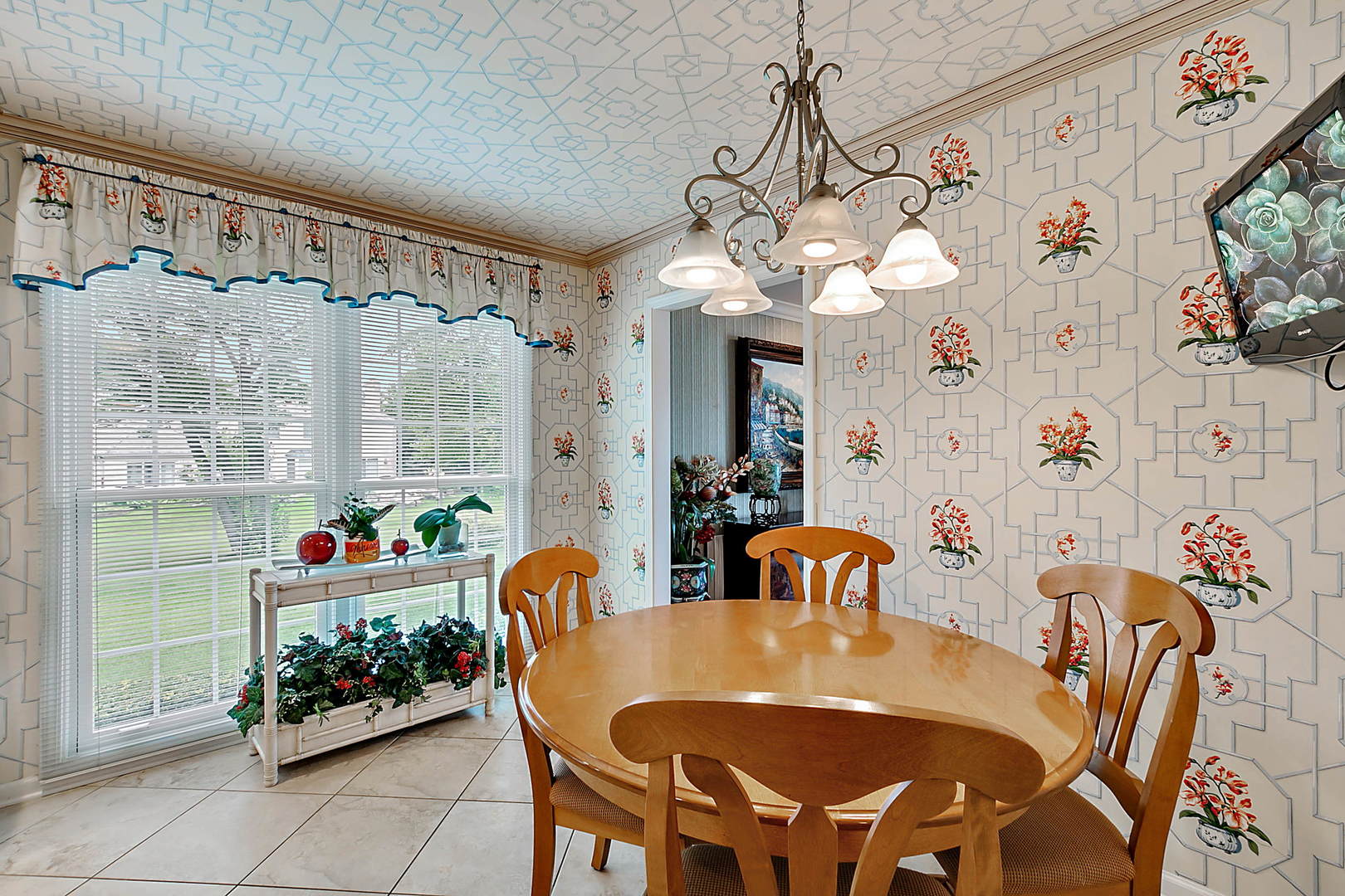 2552 Indian Ridge Court Glenview, IL 60026 - Photo 17 of 45 a view of a dining room with furniture and chandelier
