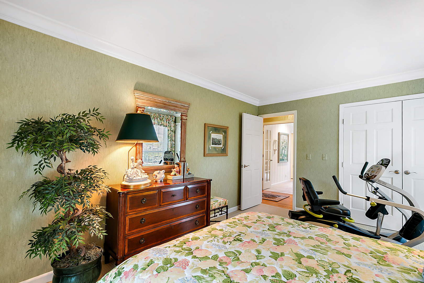 2552 Indian Ridge Court Glenview, IL 60026 - Photo 22 of 45 a bed room with a bed window and potted plant