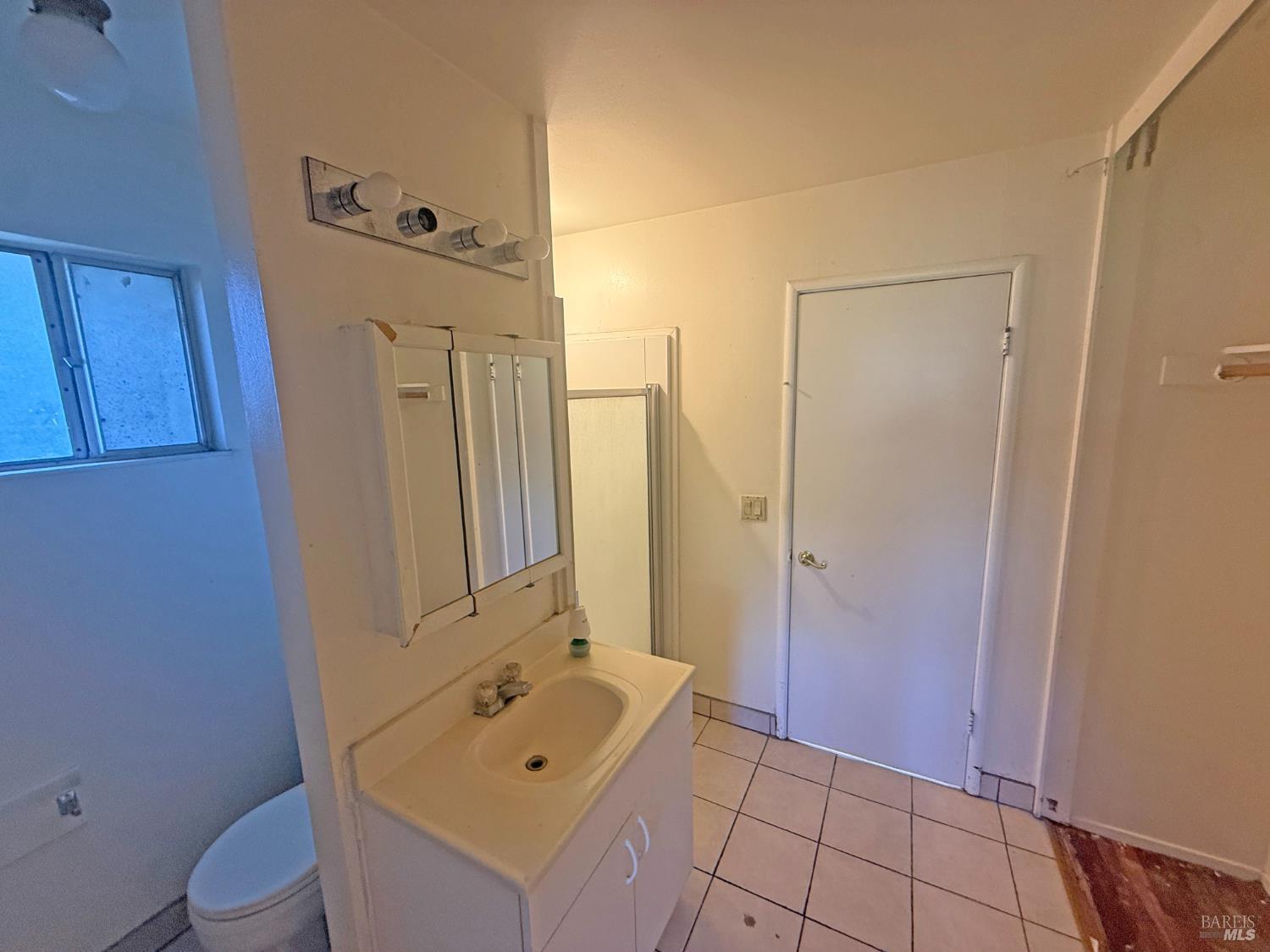 806 Finch Way Fairfield, CA 94533 - Photo 11 of 14 a bathroom with a sink a toilet and shower