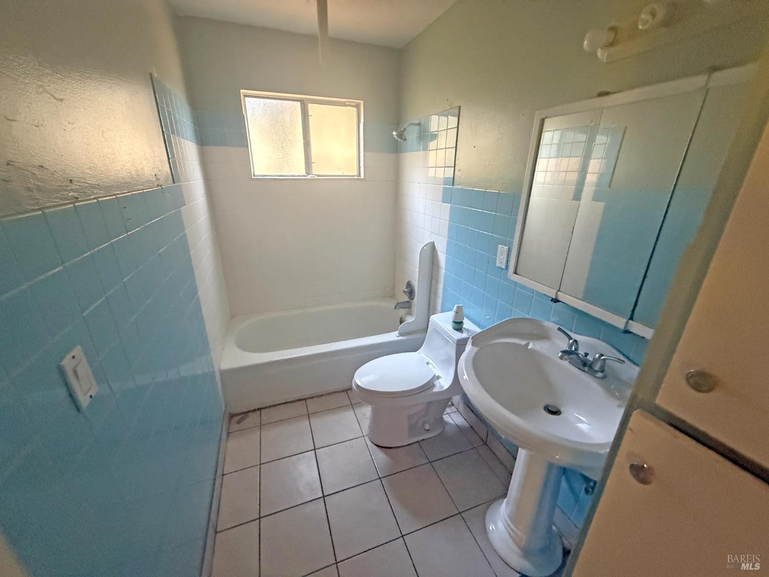 806 Finch Way Fairfield, CA 94533 - Photo 12 of 14 a bathroom with a sink toilet and shower
