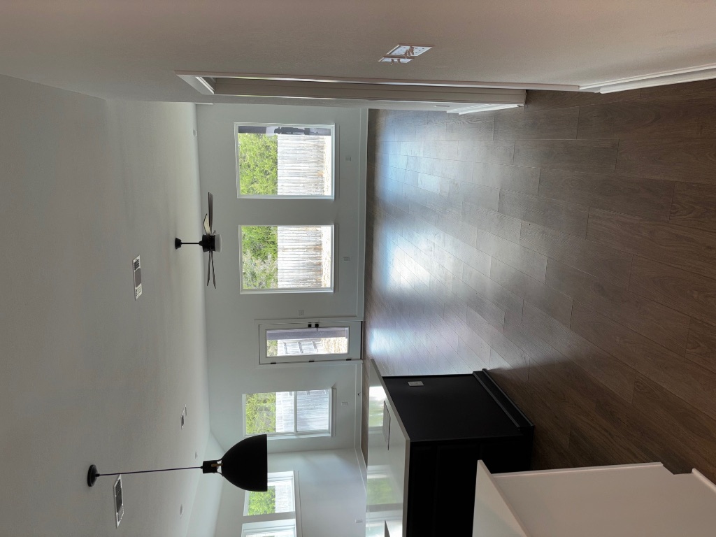2128 Little Snake Way Georgetown, TX 78633 - Photo 15 of 32 a kitchen with stainless steel appliances granite countertop a stove a sink a window and wooden floor
