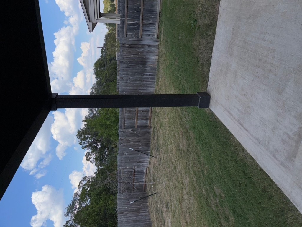 2128 Little Snake Way Georgetown, TX 78633 - Photo 28 of 32 a backyard of a house with lots of green space