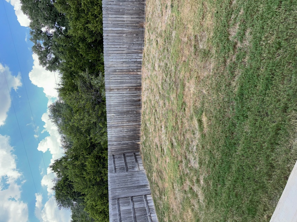 2128 Little Snake Way Georgetown, TX 78633 - Photo 29 of 32 a view of outdoor space with wooden fence