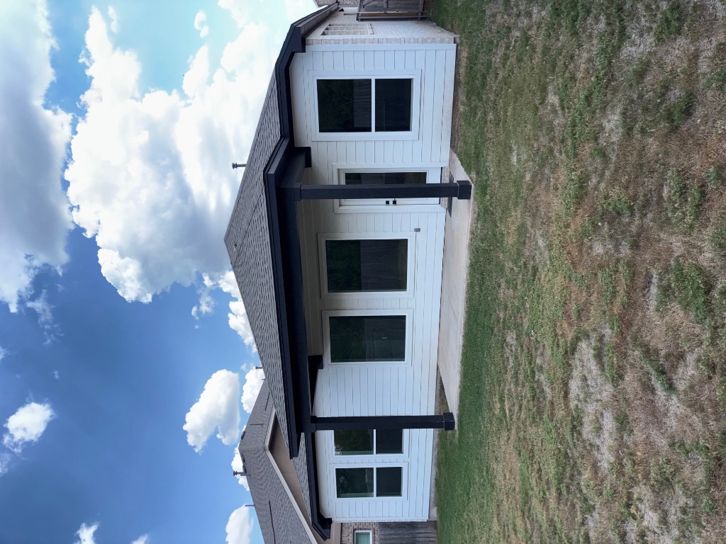 2128 Little Snake Way Georgetown, TX 78633 - Photo 30 of 32 a view of a backyard of the house