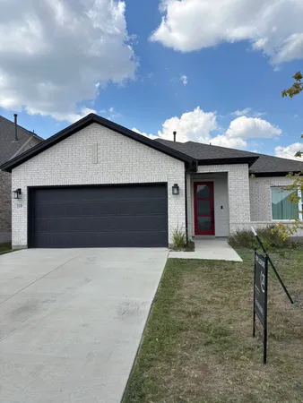 a front view of house with yard