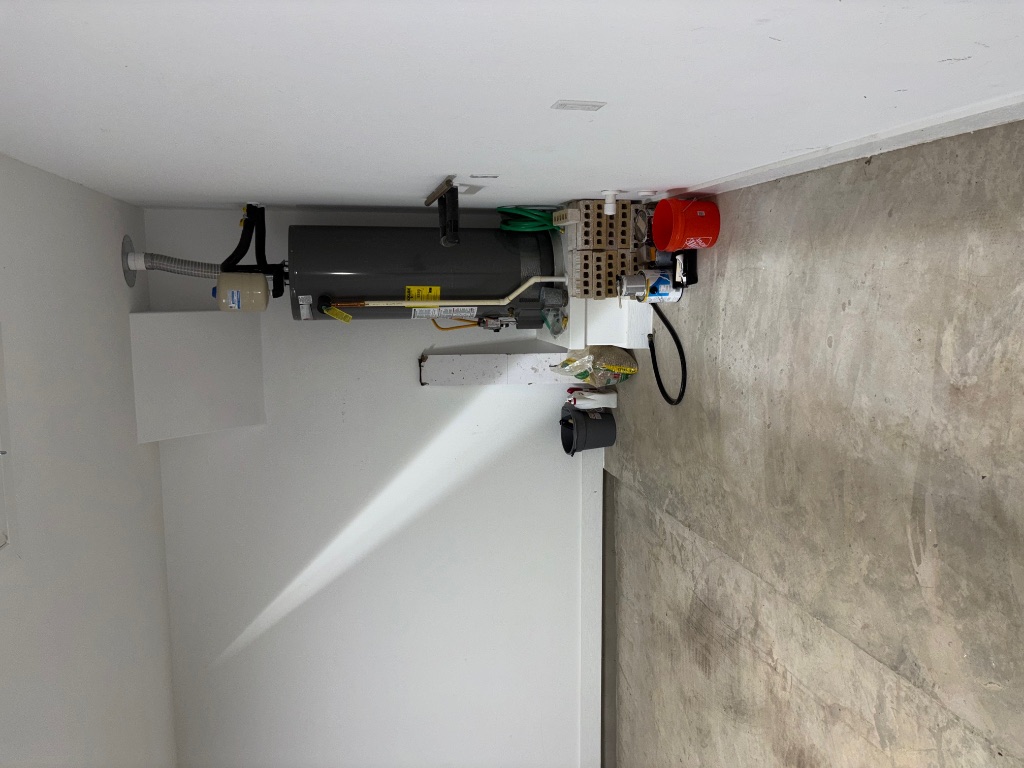 2128 Little Snake Way Georgetown, TX 78633 - Photo 32 of 32 a view of storage and utility room with racks on the wall