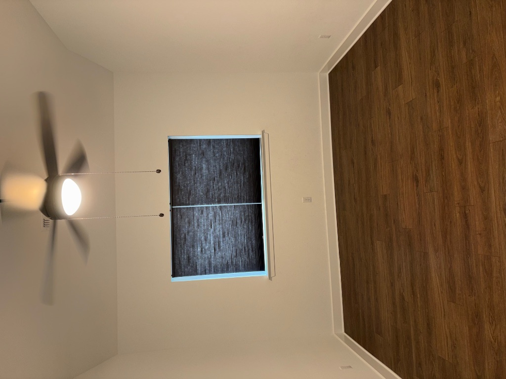 2128 Little Snake Way Georgetown, TX 78633 - Photo 5 of 32 a view of an empty room with wooden floor