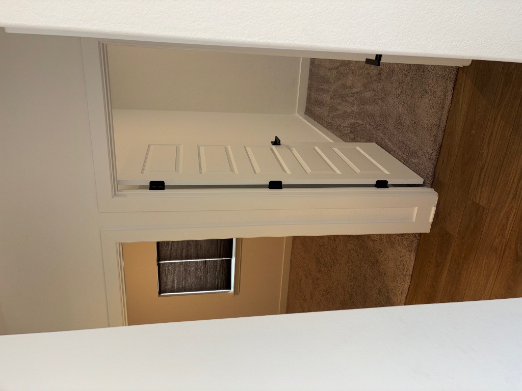 2128 Little Snake Way Georgetown, TX 78633 - Photo 6 of 32 a view of a hallway with wooden floor