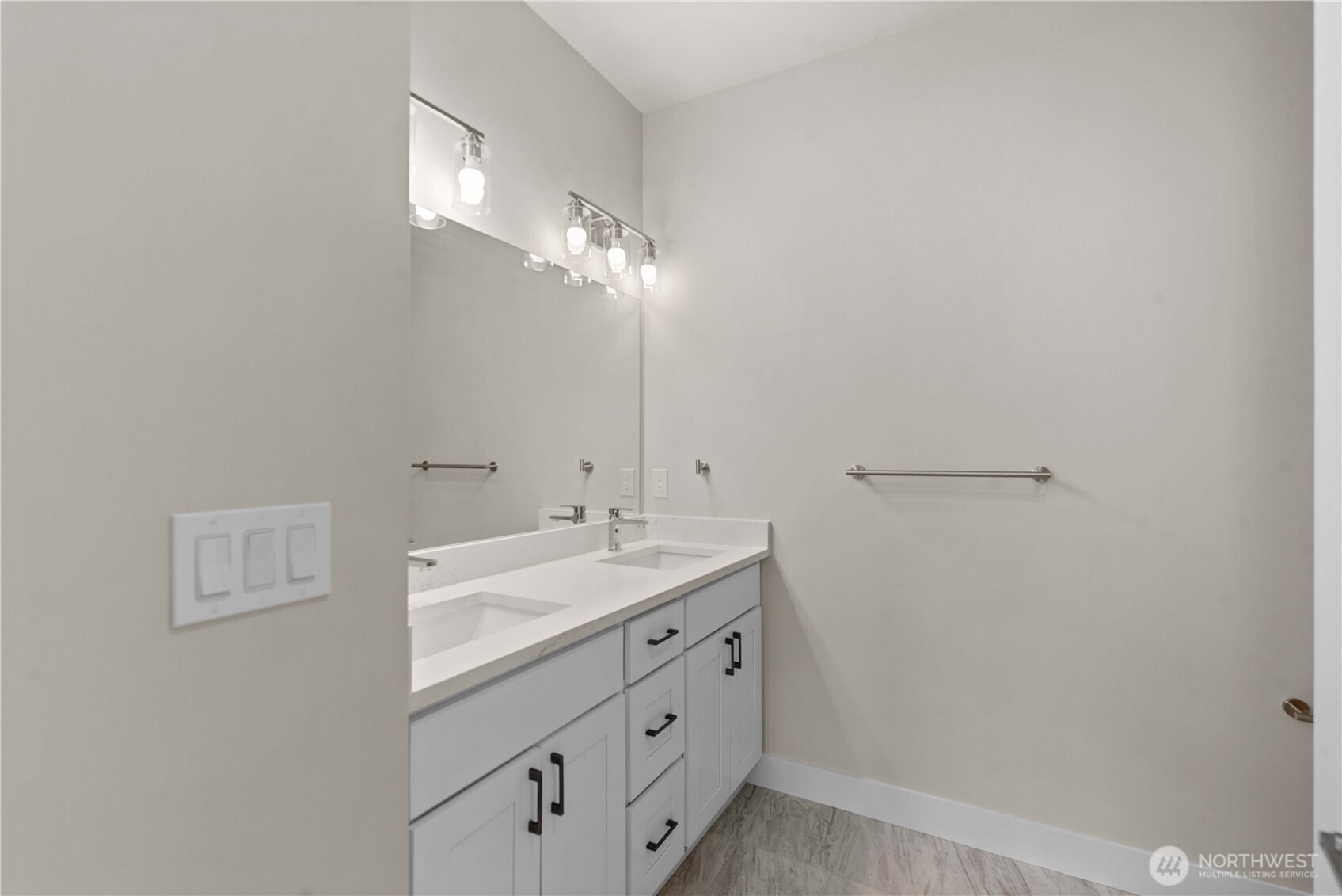 1030 Finch Lane, Unit A3 Wenatchee, WA 98801 - Photo 16 of 24 a bathroom with a sink and a mirror