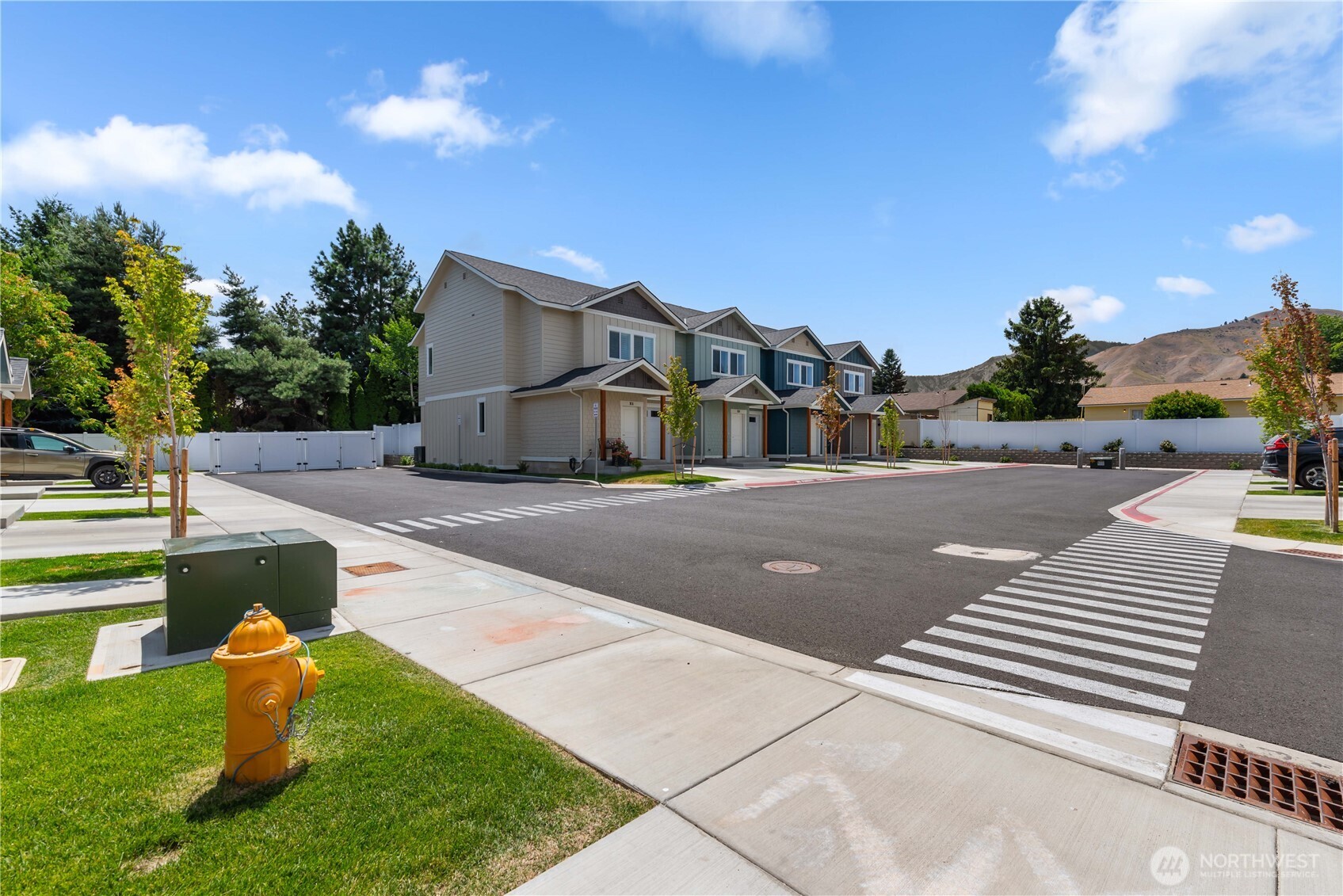 1030 Finch Lane, Unit A3 Wenatchee, WA 98801 - Photo 2 of 24 a view of a street with houses