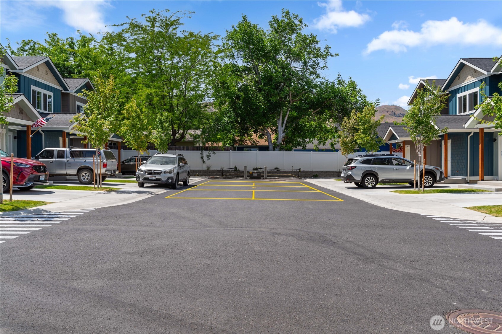 1030 Finch Lane, Unit A3 Wenatchee, WA 98801 - Photo 5 of 24 a car parked on the side of the road