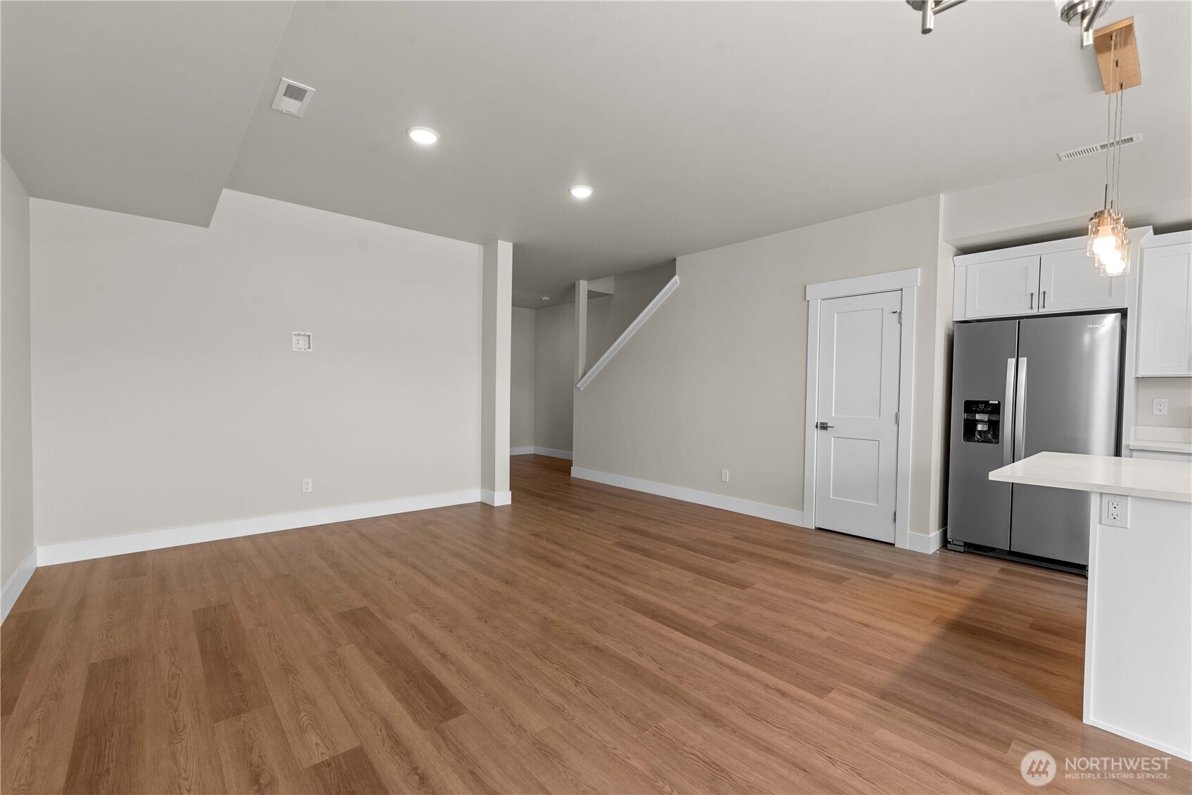 1030 Finch Lane, Unit A3 Wenatchee, WA 98801 - Photo 8 of 24 a view of empty room with wooden floor
