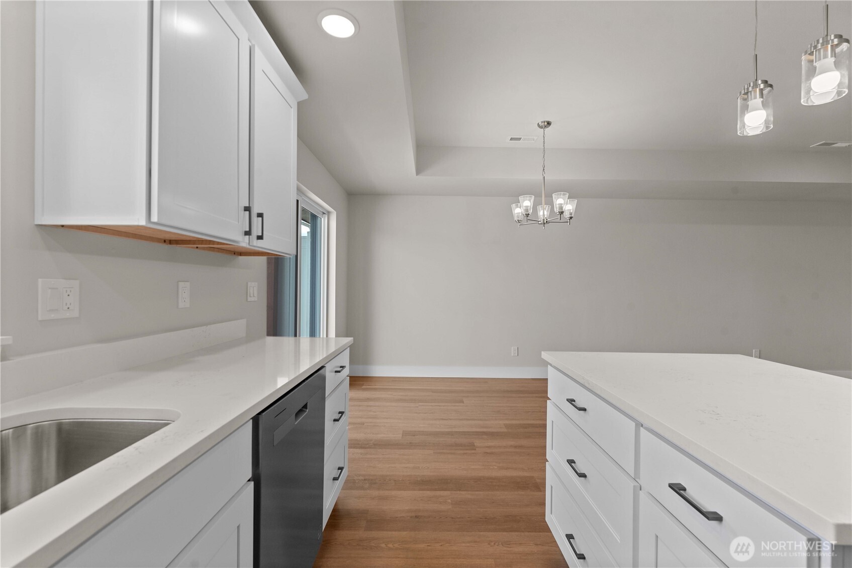 1030 Finch Lane, Unit A3 Wenatchee, WA 98801 - Photo 9 of 24 a kitchen with a sink and cabinets
