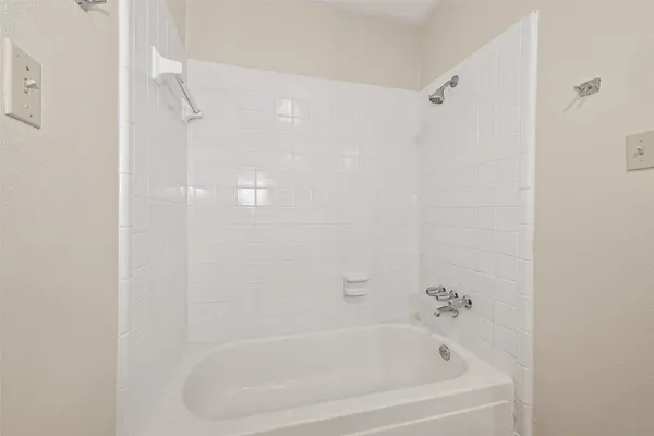 a close view of a bathtub in bathroom