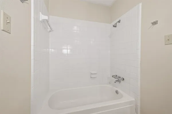 a close view of a bathtub in bathroom