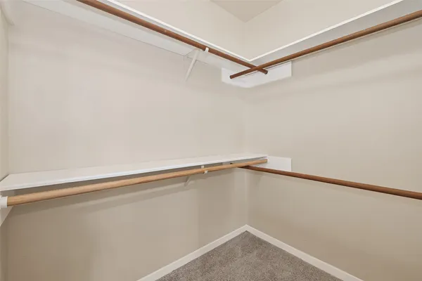 a view of a room with racks on the wall