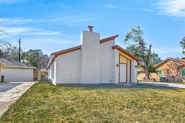 a house with trees in front of it