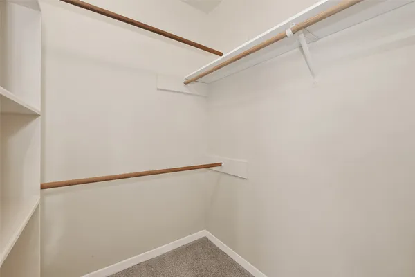 a view of a room with racks on the wall