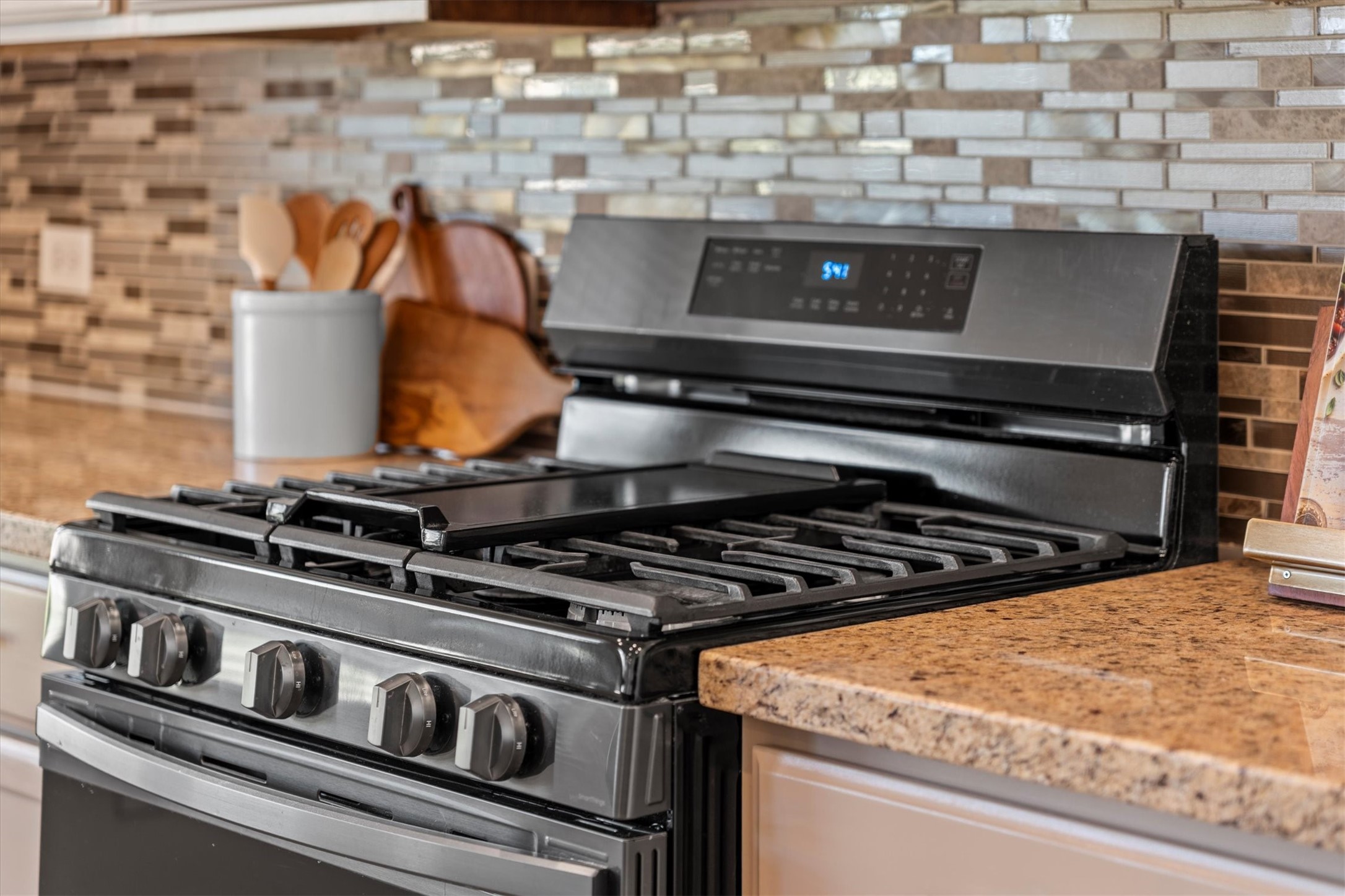 4022 Streambed Trail Houston, TX 77068 - Photo 17 of 32 a close view of a stove top oven