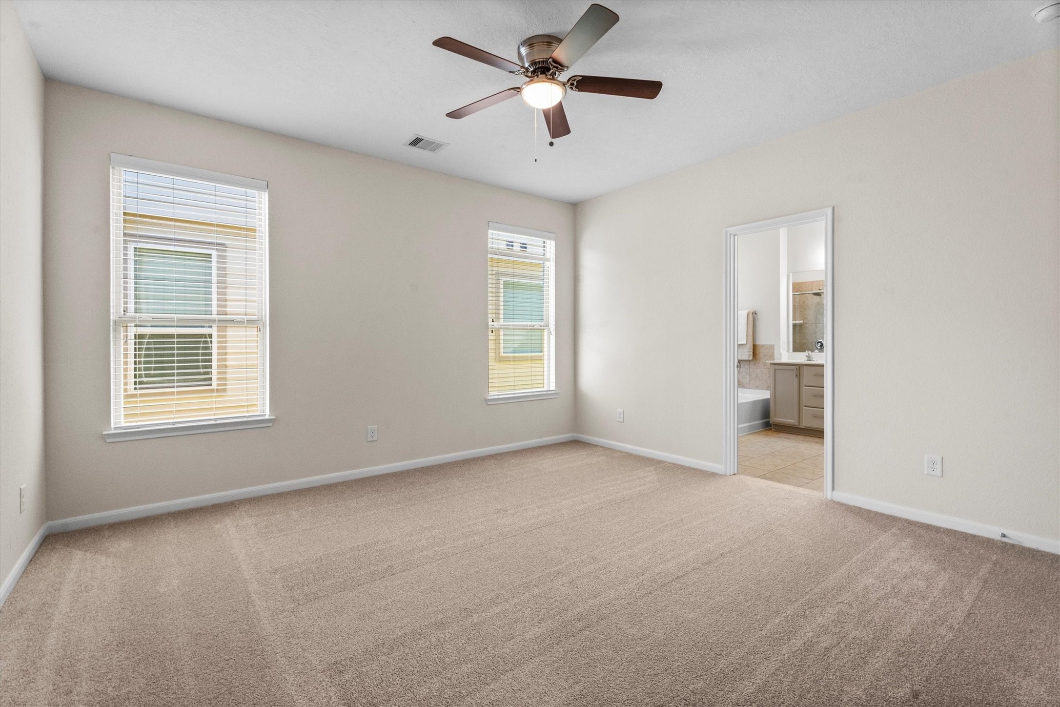 4022 Streambed Trail Houston, TX 77068 - Photo 18 of 32 a view of an empty room with a window