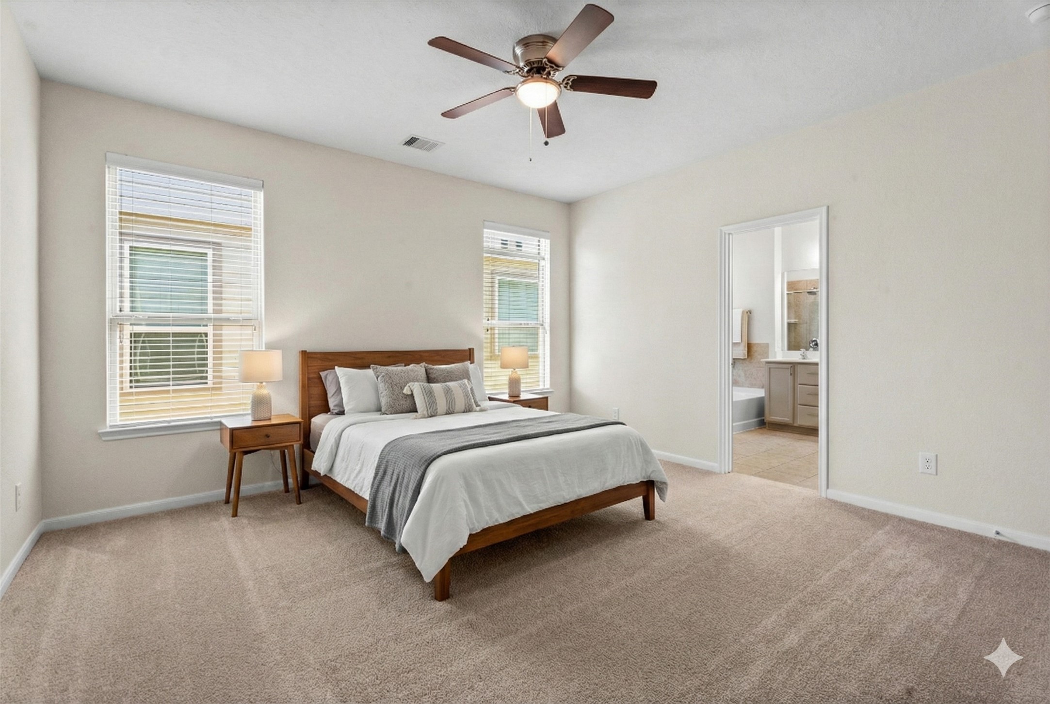 4022 Streambed Trail Houston, TX 77068 - Photo 5 of 32 a spacious bedroom with a bed and a window