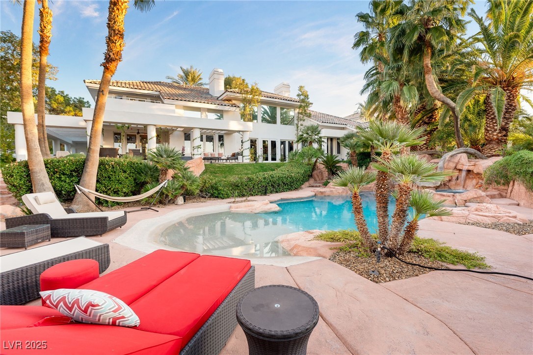 2057 Troon Drive Henderson, NV 89074 - Photo 16 of 41 Outdoor pool with an outdoor hangout area and a patio area