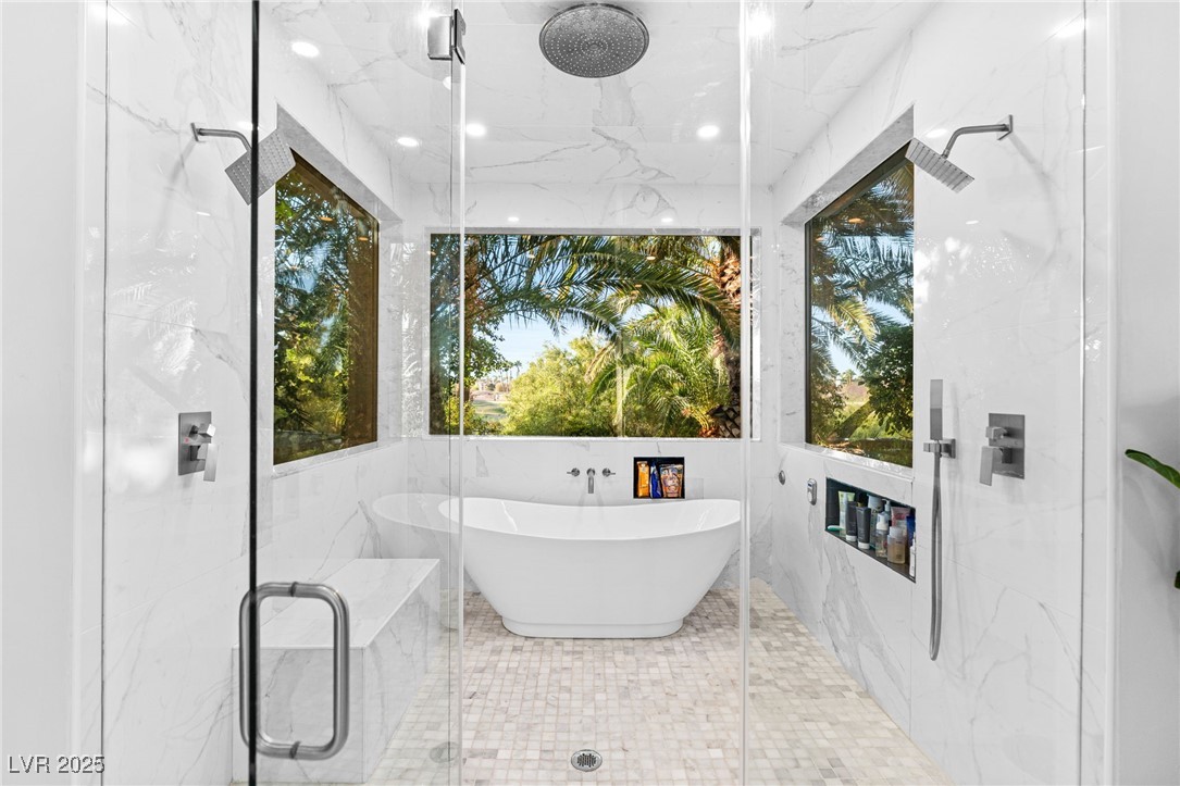 2057 Troon Drive Henderson, NV 89074 - Photo 18 of 41 Full bathroom featuring a marble finish shower and a freestanding bath