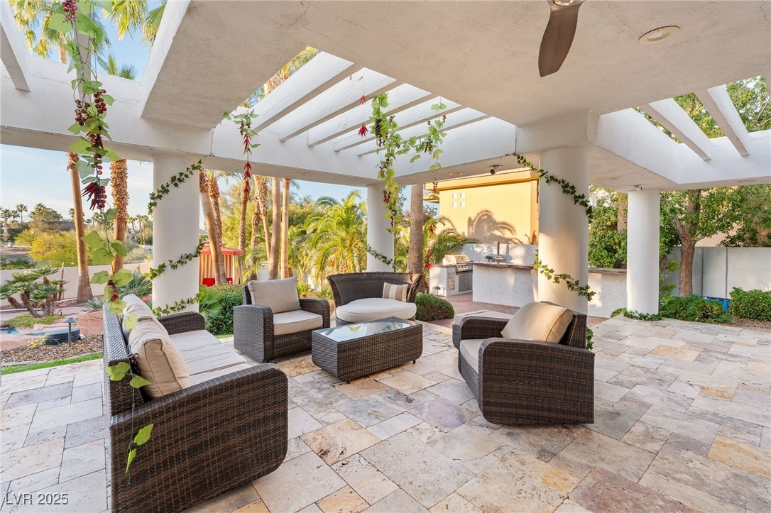 2057 Troon Drive Henderson, NV 89074 - Photo 34 of 41 View of patio / terrace featuring a pergola, a ceiling fan, and area for grilling