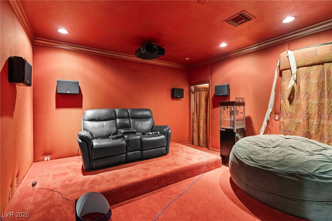 2057 Troon Drive Henderson, NV 89074 - Photo 38 of 41 Carpeted home theater featuring crown molding, a textured wall, and recessed lighting