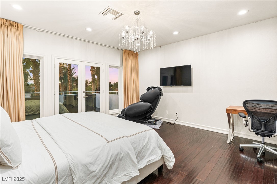 2057 Troon Drive Henderson, NV 89074 - Photo 41 of 41 Bedroom featuring french doors, recessed lighting, dark wood-style flooring, access to outside, and a chandelier