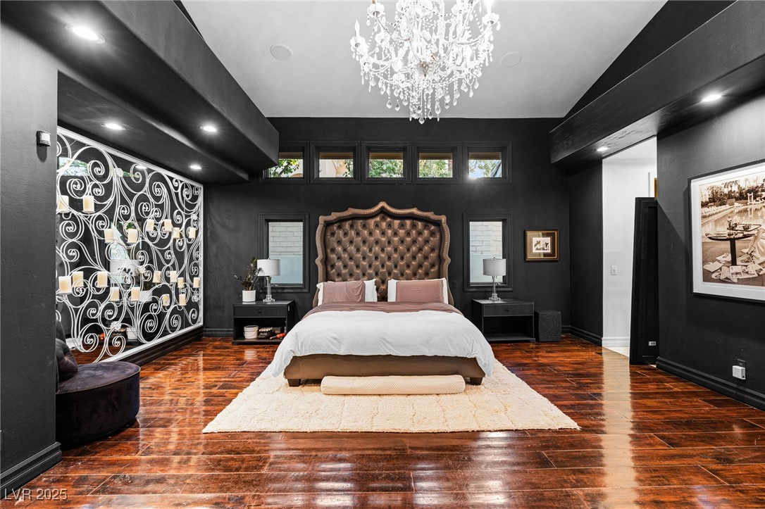 2057 Troon Drive Henderson, NV 89074 - Photo 5 of 41 Bedroom with recessed lighting, dark wood-style flooring, and a chandelier