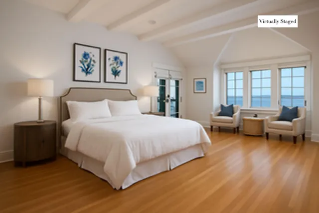 a bedroom with a bed and a couch