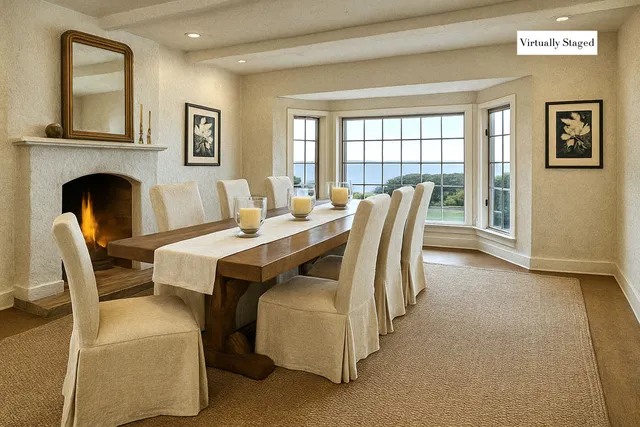 a dining room with furniture and a fireplace