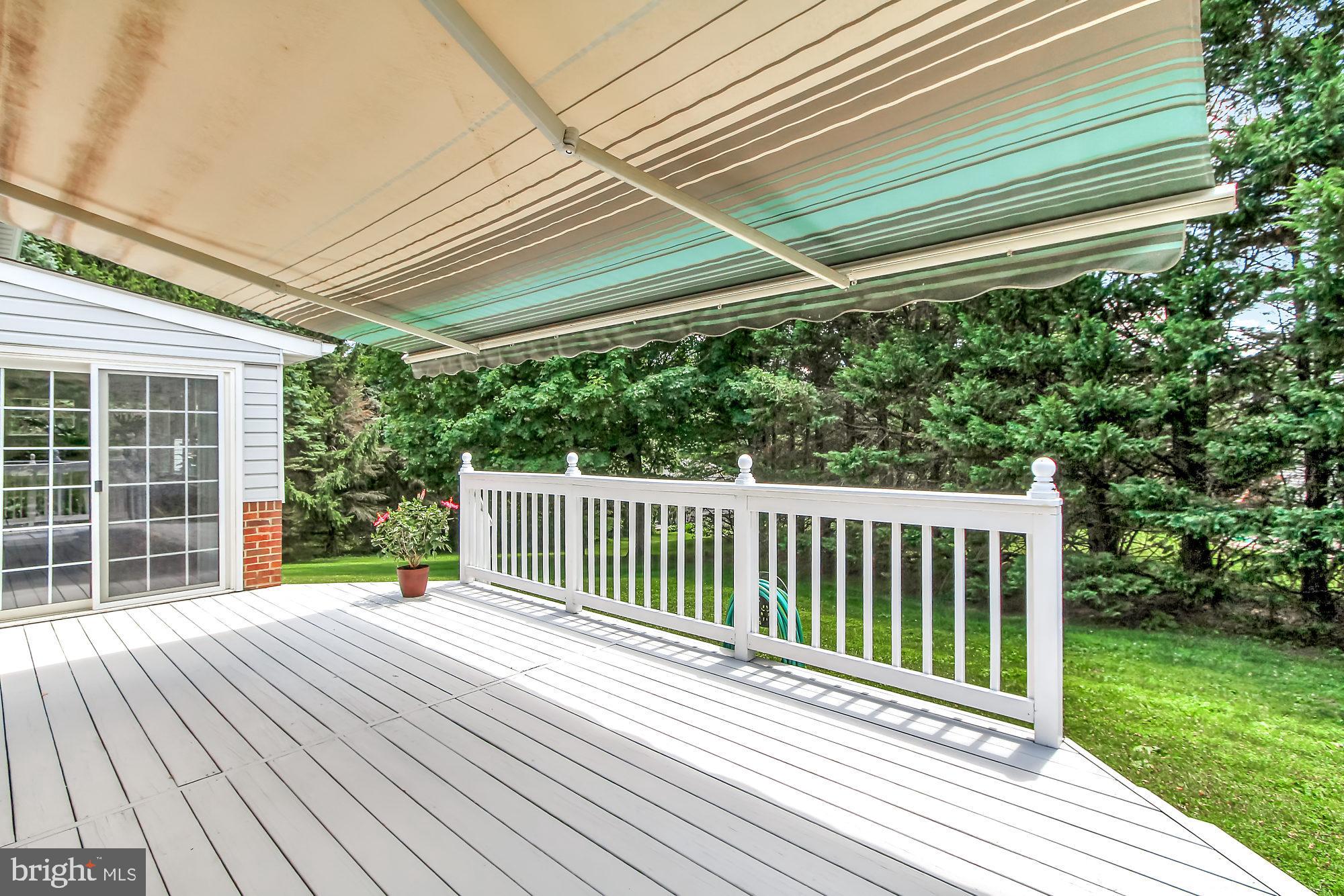 28 Stone Ridge Drive New Freedom, PA 17349 - Photo 20 of 26 Deck with Sunsetter