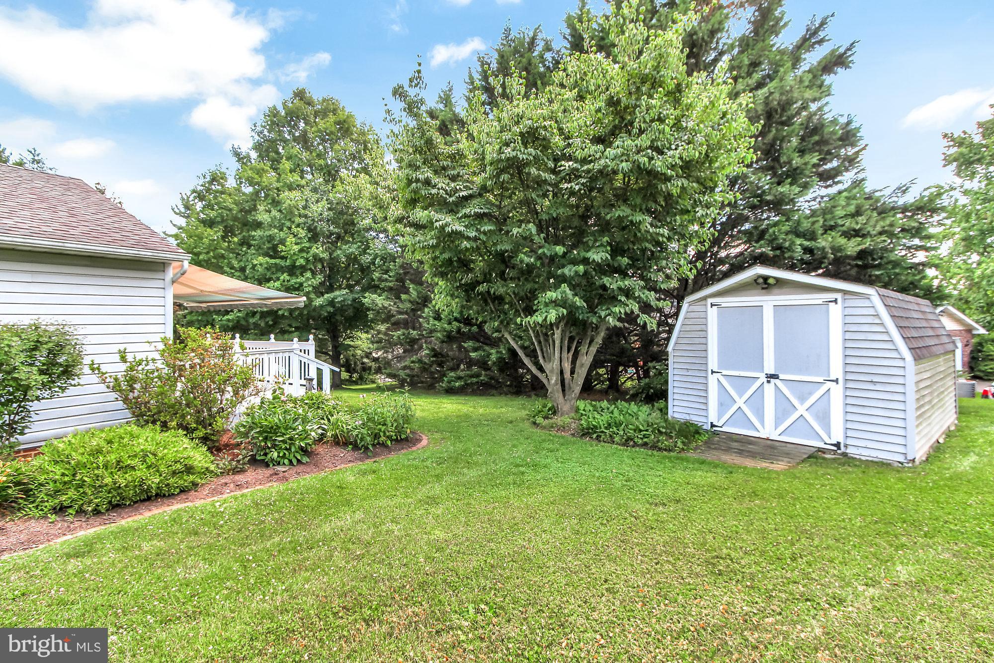 28 Stone Ridge Drive New Freedom, PA 17349 - Photo 22 of 26 Side yard with shed