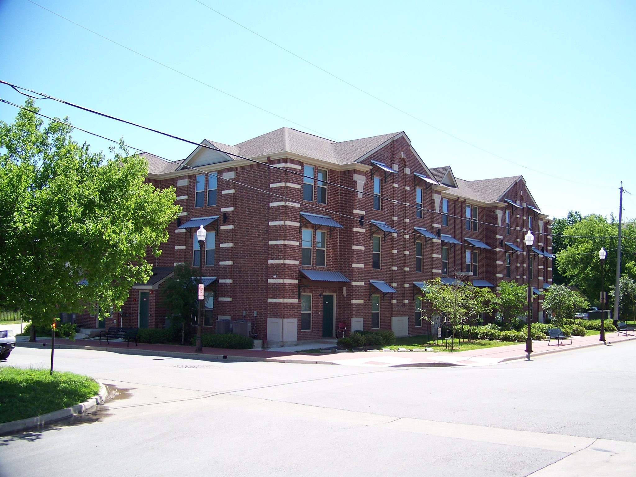 300 Spruce Street College Station, TX 77840 - Photo 15 of 16 a view of a brick building next to a yard